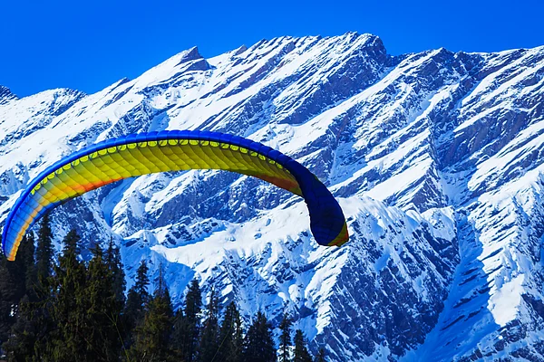Peppy Graphics/Shutterstock : Paragliding in the Solang Valley near Manali