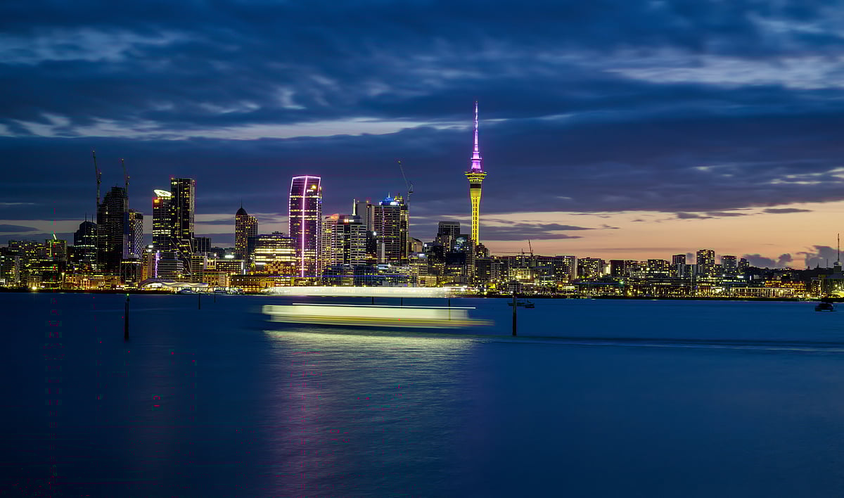 Sky tower lit up in pink and yellow to celebrate Diwali in Auckland