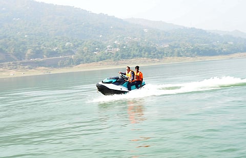 Sukhu enjoying a jet ski ride