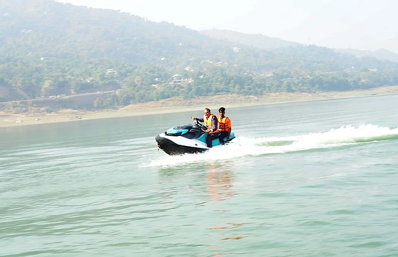 Sukhu enjoying a jet ski ride