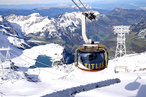 Climb the summit by riding the Titlis Rotair, the first rotating cable car in history