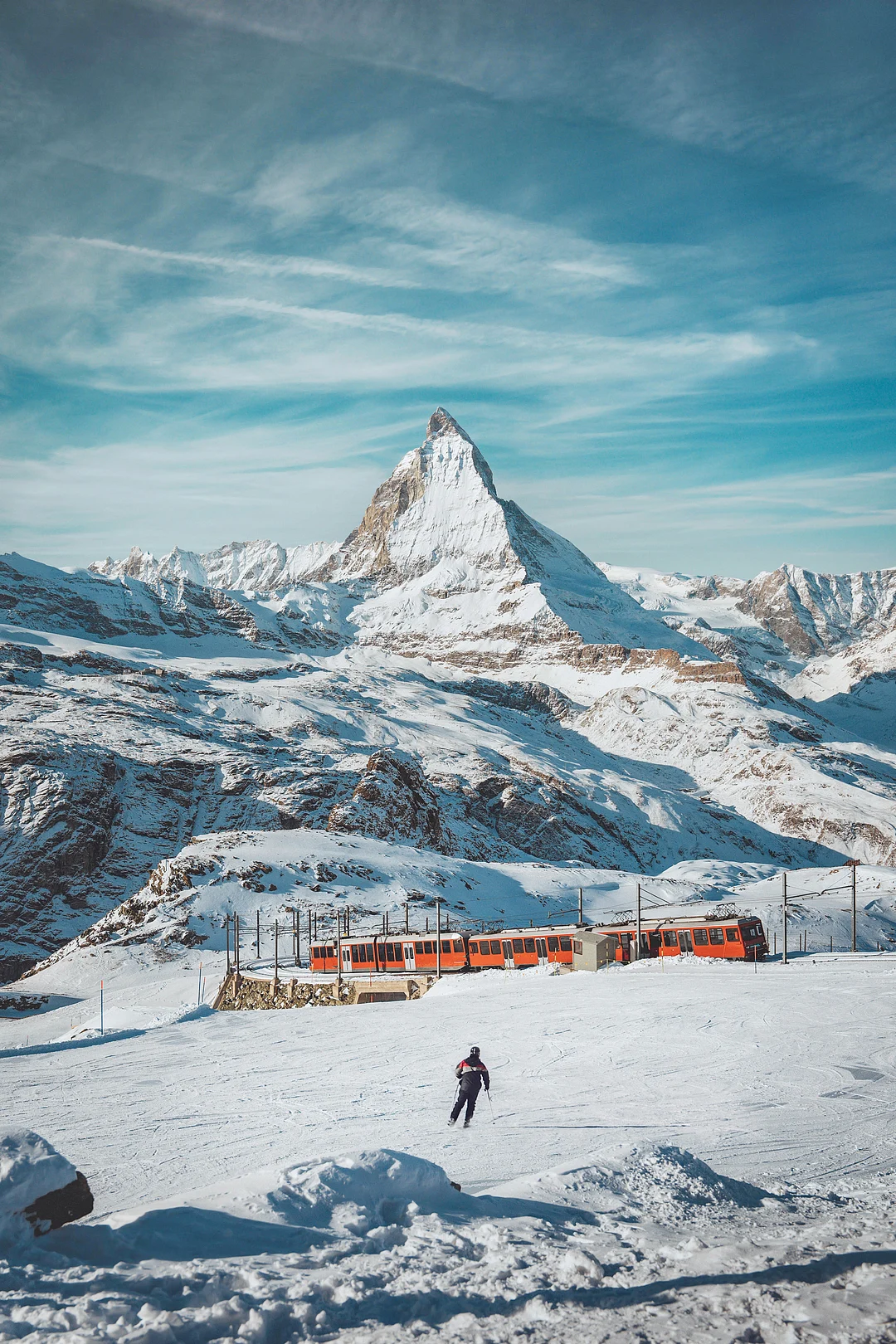 A solitary skier in the landscape of Zermatt