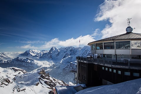 Beautiful alpine panorama on a sunny day from the top of Schilthorn
