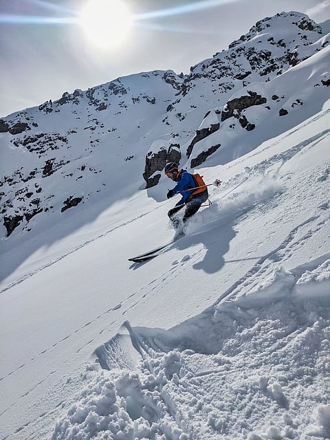 Deep snow ski descent from Buelenhorn in Davos Monstein, Switzerland
