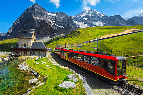 A tourist train coming down from the mountain station, Jungfraujoch, Bernese Oberland