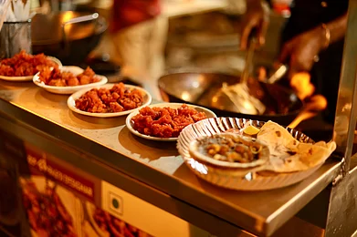 Shutterstock.com : Food street at VV Puram