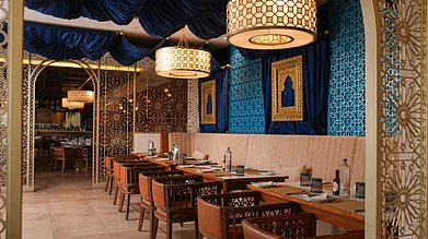 Öz by Kebapci : Designed by Turkish interior designer Mert Duyal, the 6,000-square-foot restaurant evokes a contemporary Turkish vibe with its blue and gold interiors