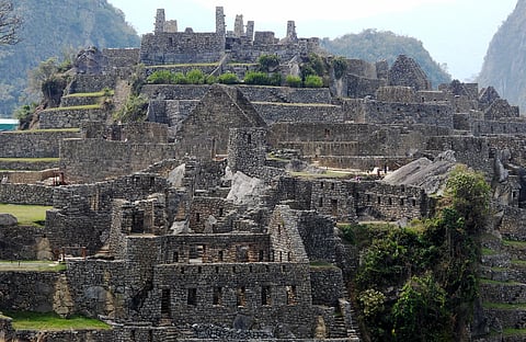 Machu Picchu, the ancient citadel unveiled itself like a scene from a postcard