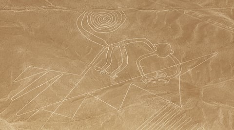 Aerial view of the mysterious Monkey geoglyph, one of the iconic Nazca Lines