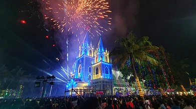 Santhosh Varghese/Shutterstock : An illuminated church in Kochi during Christmas