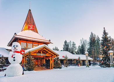 Roman Babakin/Shutterstock : The Santa Claus Village in Rovaniemi, Finland, opened in 1985