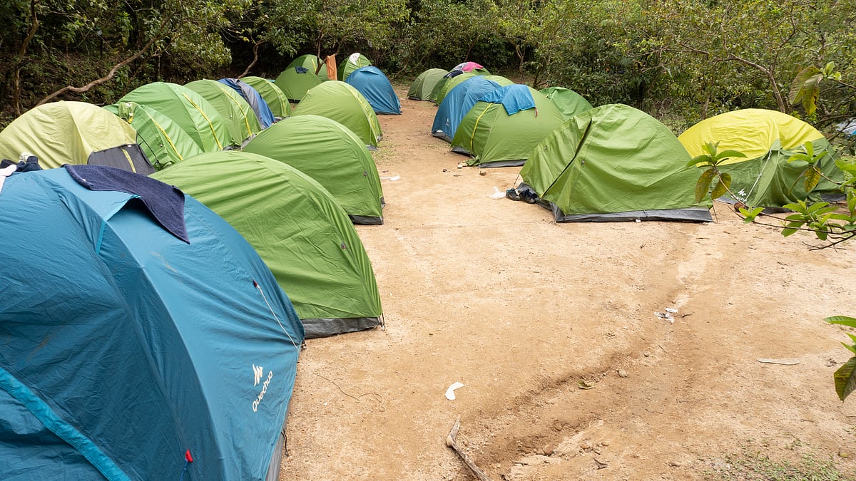 Trekkers camping near Forest Department Office to get some rest before the strenuous trek to Kumara Parvatha
