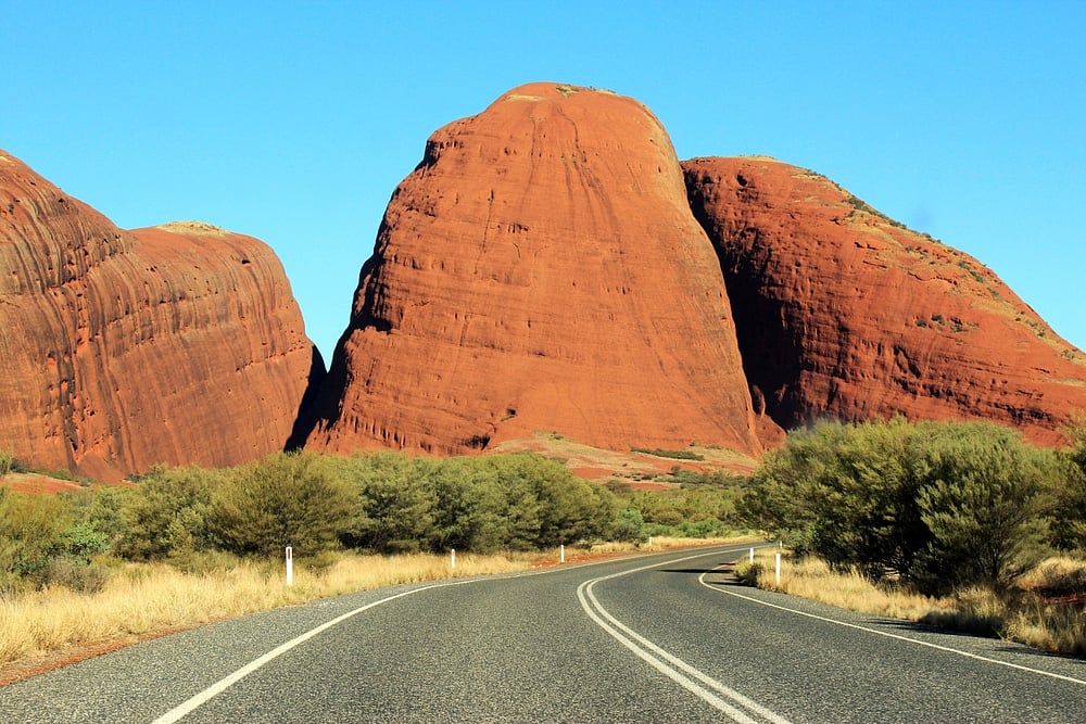 The Red Centre Way passes through Kata Tjuta (The Olgas), a set of monoliths in Uluru Kata Tjuta National Park