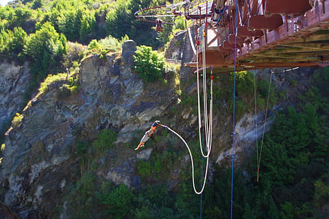 Free-falling from the highest bungee jump point in New Zealand