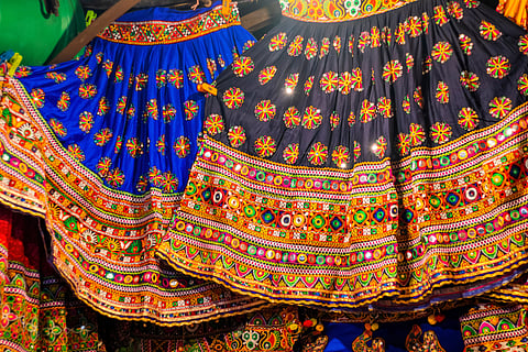 Colourful clothes for sale at the Law Garden market