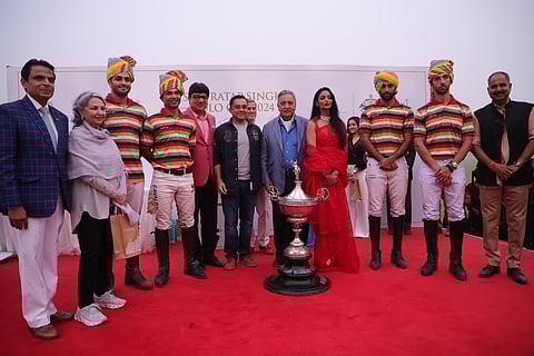 His Highness Maharaja Gajsingh II of Marwar-Jodhpur (left), Padma Bhushan awardee and actor Sharmila Tagore (second from left), and Puneet Chhatwal, the managing director and CEO of IHCL (in pink), stand with dignitaries and members of the winning team, Jaipur Delta, at the presentation ceremony for the Sir Pratap Singh Polo Cup 2024