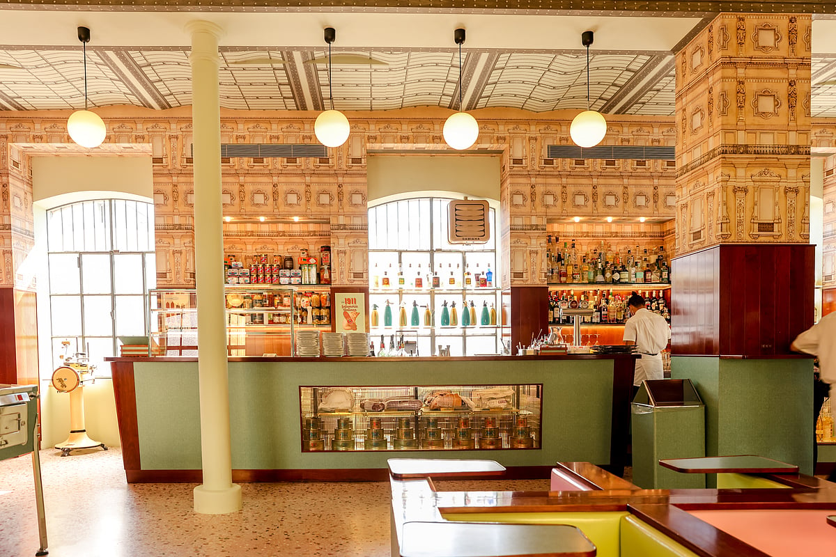 Interior exhibits and the cafe at Fondazione Prada in Milan