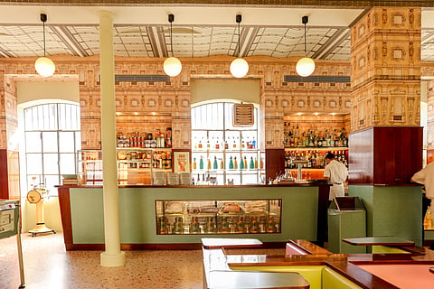 Interior exhibits and the cafe at Fondazione Prada in Milan