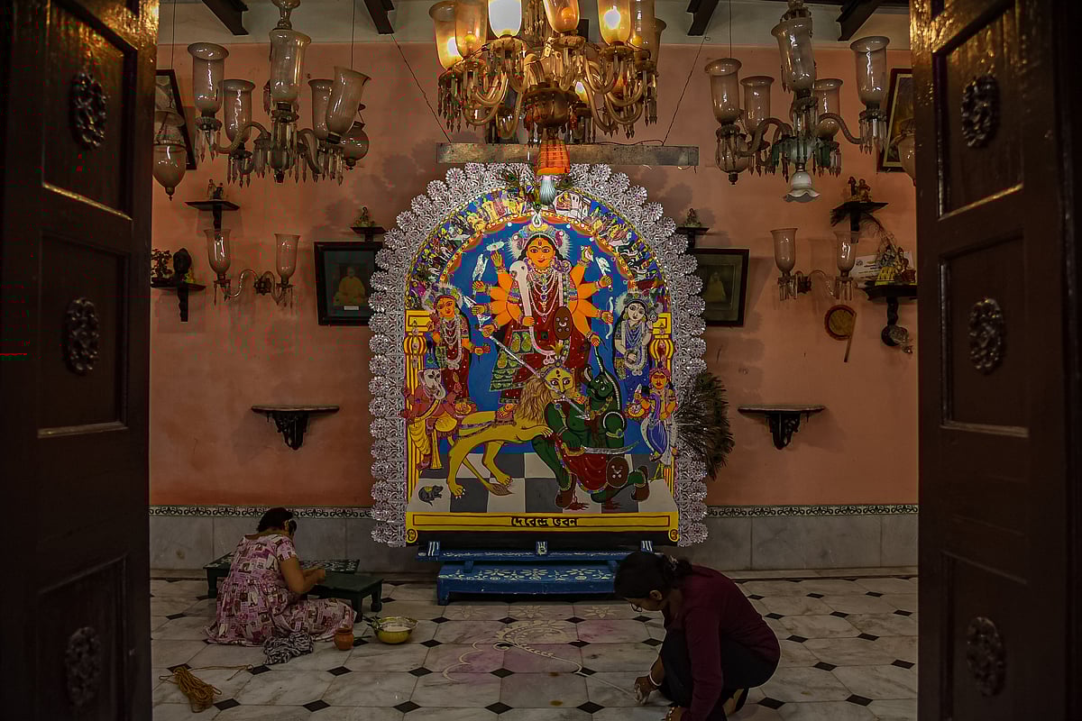 At the Debendra Bhawan in the Bardhaman district of West Bengal, the ancestors of this house started worshipping Pateshwari Durga. Every year, they paint a new image of goddess Durga, worship her and immerse the paper in krishnasayor (a water body)