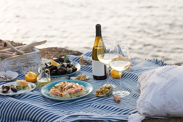 Whether you choose a glamorous dining experience or an authentic taverna, the best restaurants on the island celebrate rich traditions - Shutterstock.com