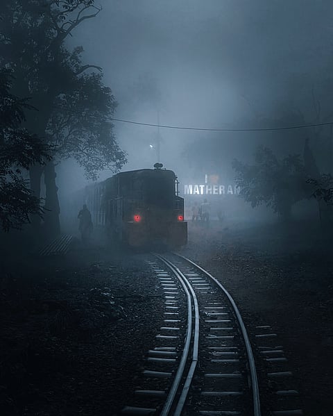 A train coming in on a foggy day in Matheran, Maharashtra