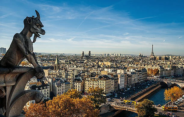 The cathedral’s famous gargoyle overlooking the city of Paris
