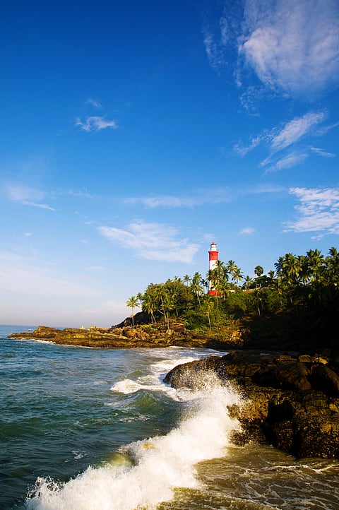 Lighthouse on coastline at Kovalam, Kerela