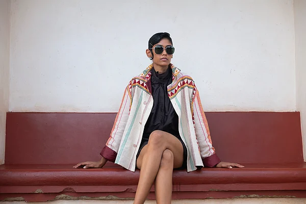 Copyright: Boito 2024 : A Dongria unisex shirt paired with Khandua coffee shorts and blouse by Boito