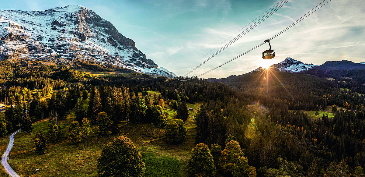Copyright: 2024 Switzerland Tourism : The Eiger Express is a gondola cableway linking Grindelwald with the Eigergletscher