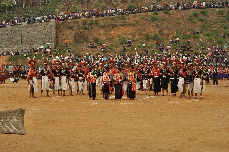 People in traditional costumes during the Aoleang festival in Mon