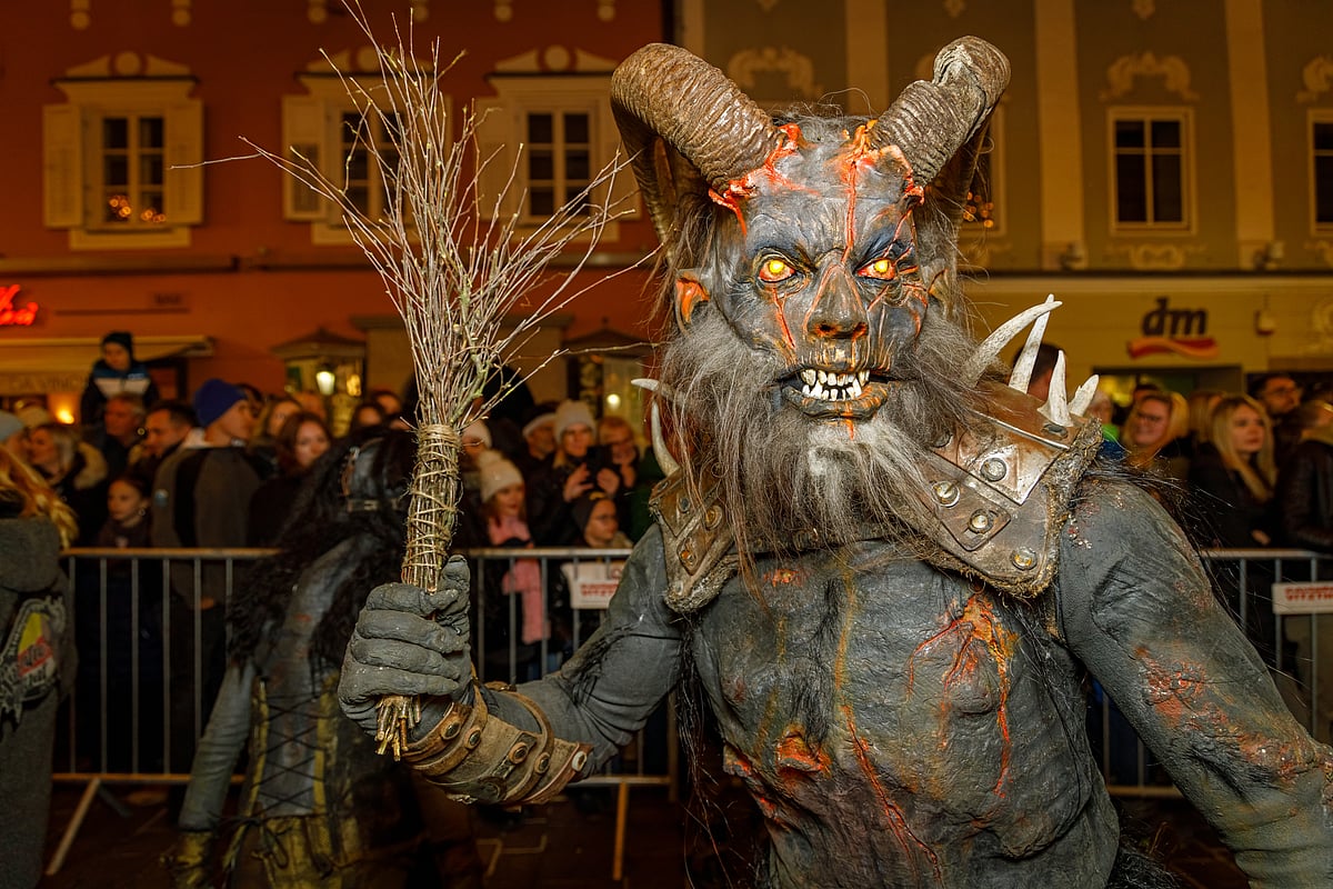 The procession of Krampus-like terrifying figures come out at the onset of evening carrying birch sticks