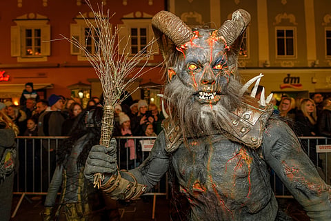The procession of Krampus-like terrifying figures come out at the onset of evening carrying birch sticks