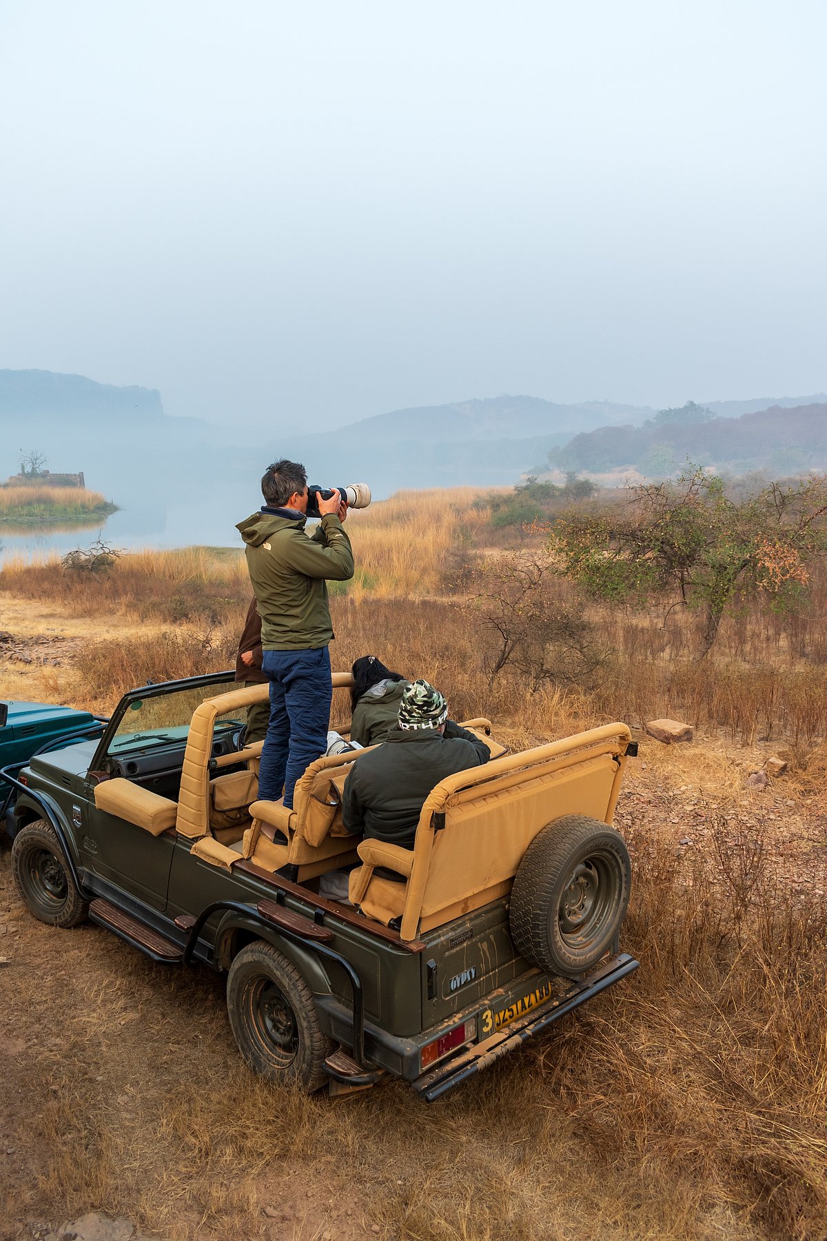 Shutterstock : A solitary jeep on a safari in a jungle
