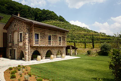 The building that houses the wine cellar and tasting room at Tenuta Castello di Morcote