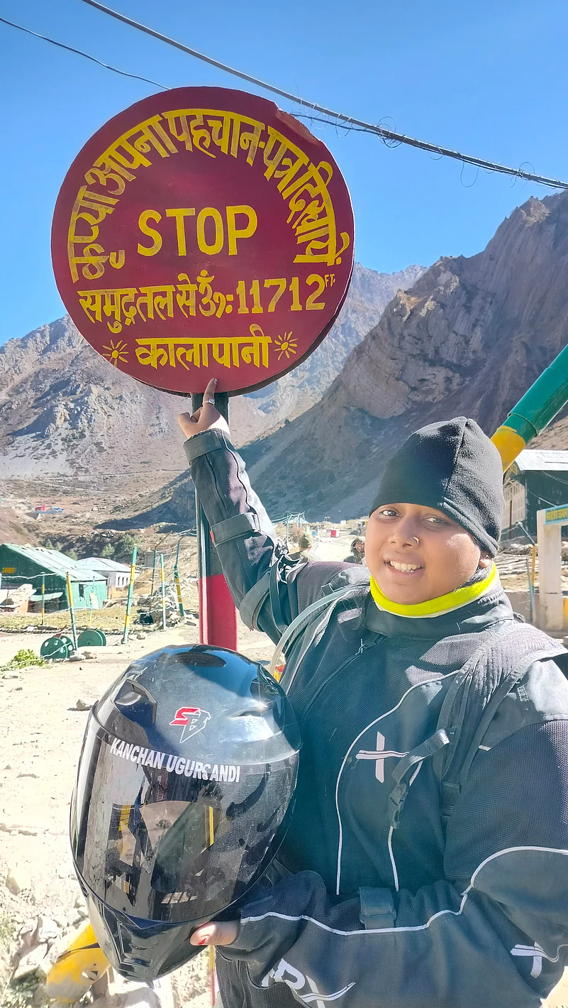Kanchan Ugursandi points to a sign marking the Kalapani territory of Uttarakhand