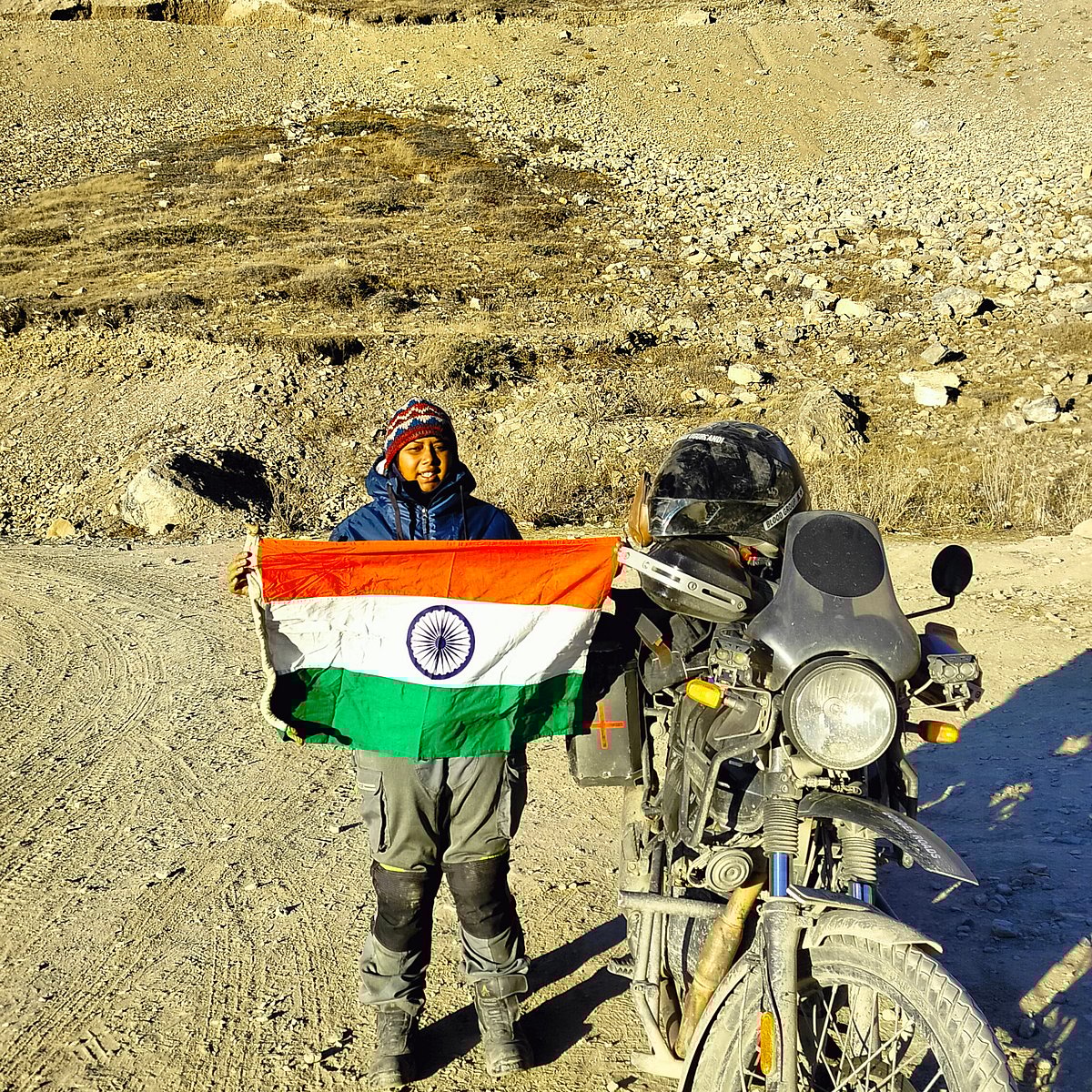 Copyright: Kanchan Ugursandi : Kanchan Ugursandi flies the Indian tricolour at the Lipulekh Pass