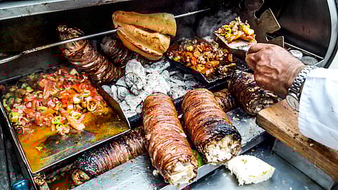 Kokoreç features tender lamb intestines expertly chargrilled