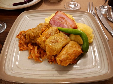 A trip to Brașov is incomplete without indulging in sumptuous Romanian cuisine. The cabbage roll is quite popular among tourists and locals alike