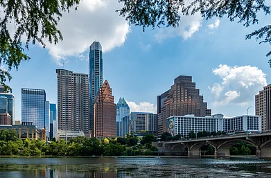 Shutterstock : Buildings and offices by the Colorado River from South Congress bridge in Austin Texas