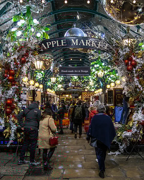 A view of the beautiful Apple Market in Covent Garden during Christmastime in London, UK