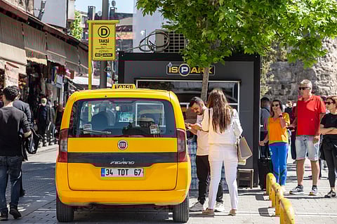 Use ride-hailing apps like BiTaksi or Uber to avoid haggling