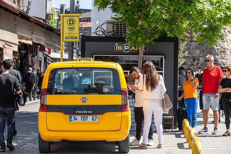 Use ride-hailing apps like BiTaksi or Uber to avoid haggling