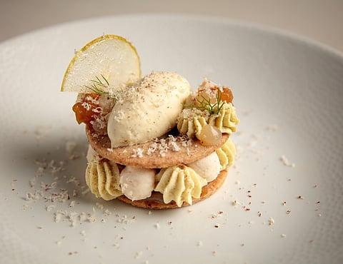Fennel mousse with rich pecan nut namalaka, Madagascan vanilla bean ice cream and caramelized apple compote by Beyond Restaurant
