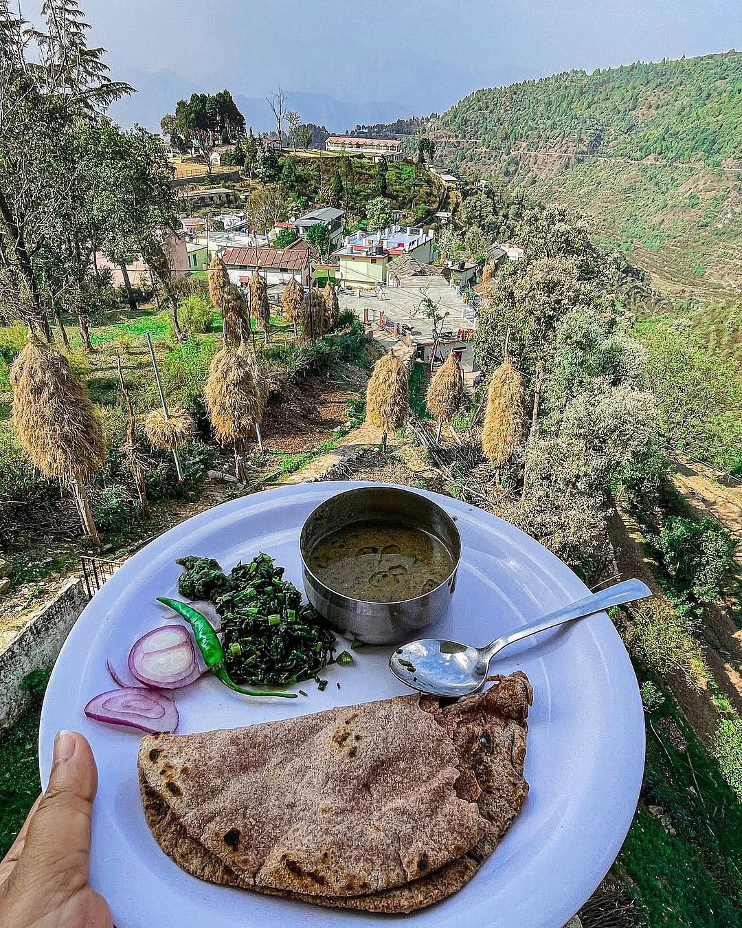 Sample local dishes such as rai saag, chainsoo, and millet rotis