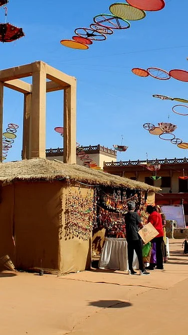 Depositphotos : A view of the colourful shopping area at the Tent City at Dhordo set up for the Rann Utsav Festival