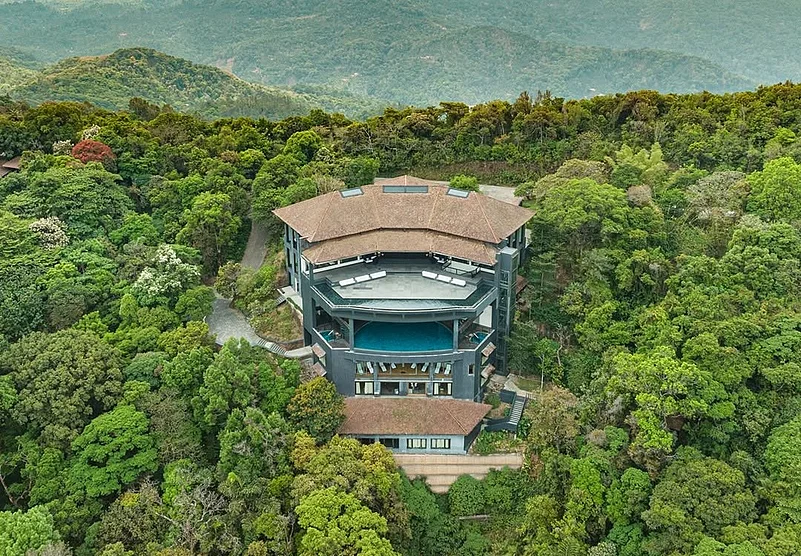 Breathtaking views of lush mountains and an evergreen rainforest canopy at Taj Madikeri Resort & Spa
