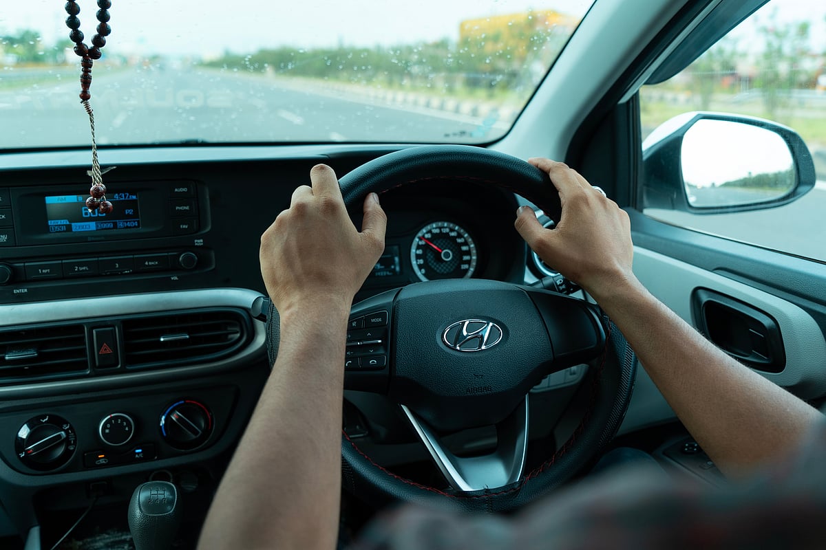 Avoid distractions like using your phone or adjusting the radio when driving 