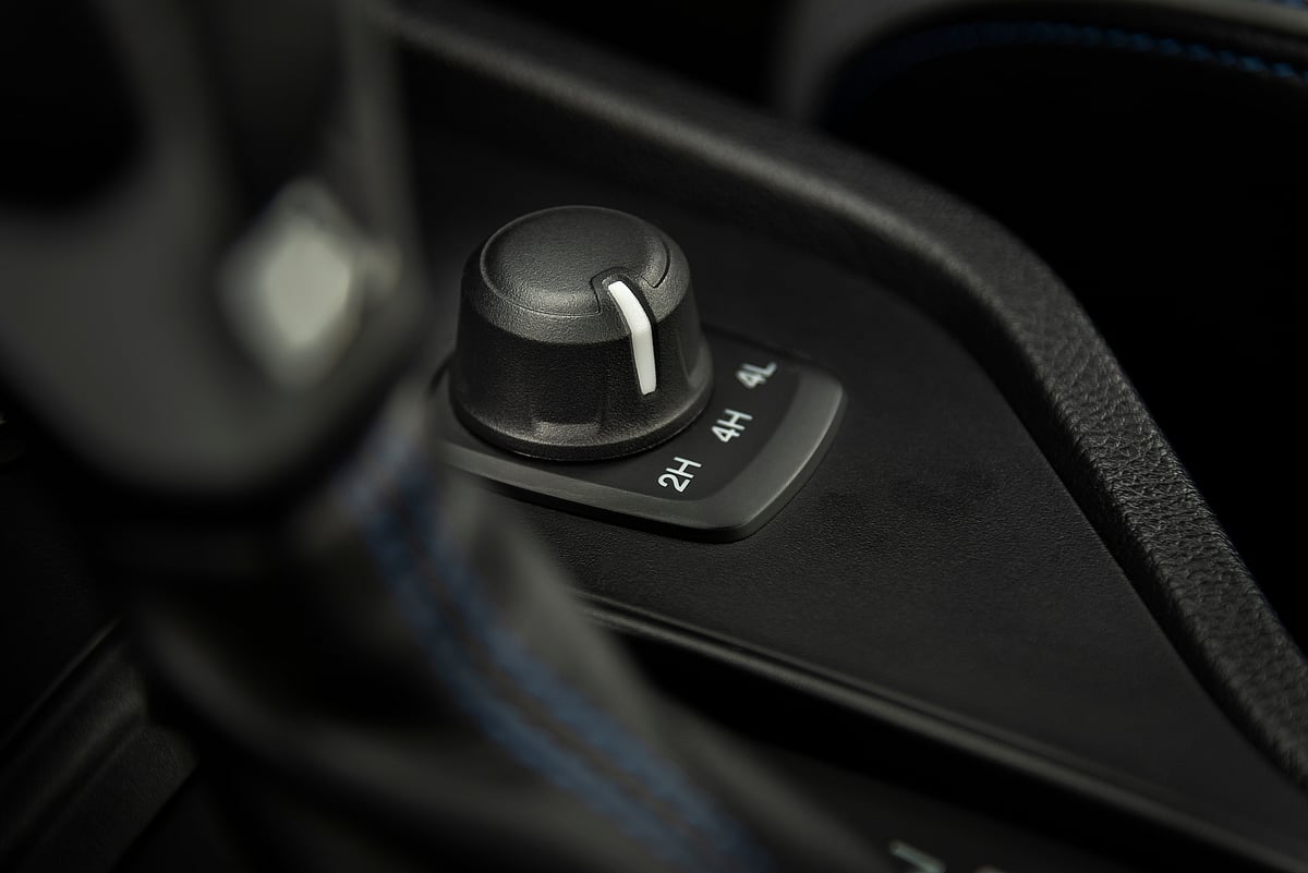 A car set to 2WD High Range (2H), the normal driving mode for a 4×4 vehicle