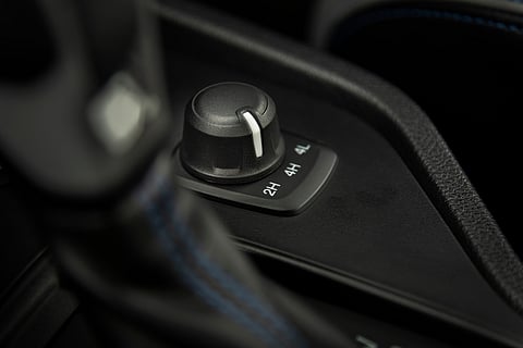 A car set to 2WD High Range (2H), the normal driving mode for a 4×4 vehicle