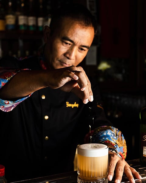 Yangdup Lama doing what he does best.